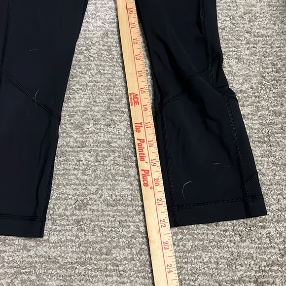 Lululemon Black Cropped Leggings with Small Hole Size 2 - Picture 2 of 7